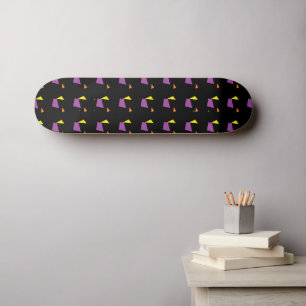 Abstract geometric shapes on black skateboard