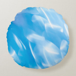 Abstract glitter lights on blue background. Round Cushion