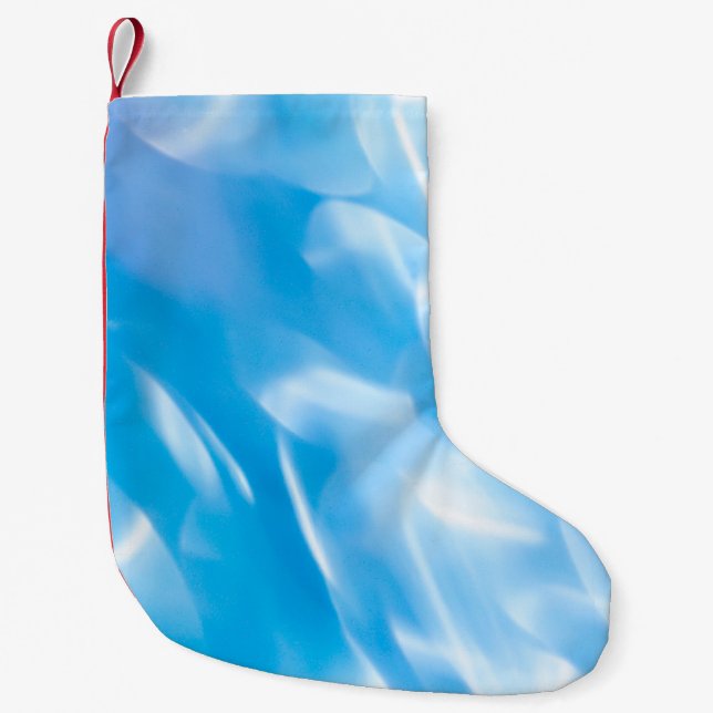 Abstract glitter lights on blue background. Round  Small Christmas Stocking (Front)