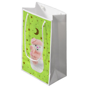 Abstract green paper with gold stars, snow woman small gift bag