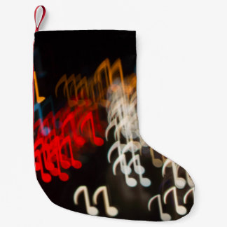 Abstract music notes: lights bokeh background small christmas stocking