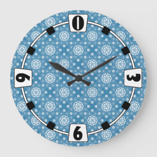 Abstract openwork floral pattern in light blue col large clock