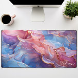 Abstract Pink Purple And Gold Personalised Desk Mat<br><div class="desc">Elevate your workspace with this personalised desk mat featuring a captivating abstract design in vibrant pink and soothing purple hues, accented with luxurious gold foil. The dynamic shapes and contrasting colours create a visually stunning and inspiring backdrop for your work. Make it truly yours by adding your name or a...</div>
