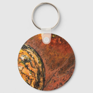 Abstract planet in red and orange key ring
