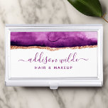 Abstract Purple And Gold Watercolor Business Card Holder<br><div class="desc">Stand out from the crowd with our abstract purple and gold watercolor business card case. The stunning watercolor design features a mix of deep purples and rich golds that create a sophisticated and elegant look, perfect for any business professional. Customise your design with your own personal information, choosing from a...</div>