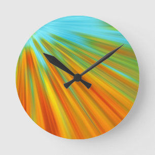 Abstract red yellow orange green stripes on blue round clock