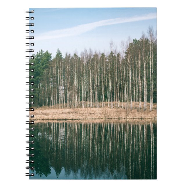 Abstract reflections of beautiful trees in the lak notebook (Front)