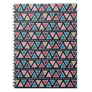 Abstract seamless hand drawn tribal pattern in tre notebook