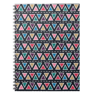 Abstract seamless hand drawn tribal pattern in tre notebook