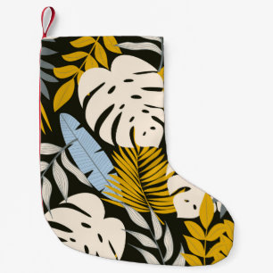 Abstract seamless pattern with tropical leaves and small christmas stocking