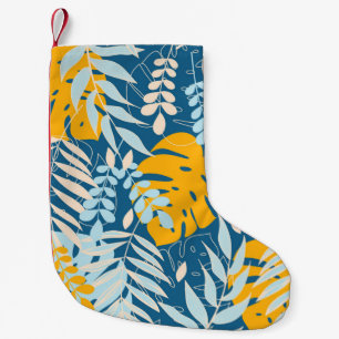 Abstract seamless pattern with tropical leaves and small christmas stocking