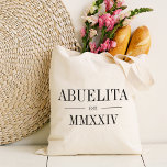 Abuelita Roman Numeral Year Established Tote Bag<br><div class="desc">A modern minimalist tote bag to celebrate a chic grandma,  this clean minimal tote features "Abuelita" or your choice of grandma nickname in black serif lettering. Customise with the year she became a grandmother beneath in elegant roman numerals for a chic touch.</div>