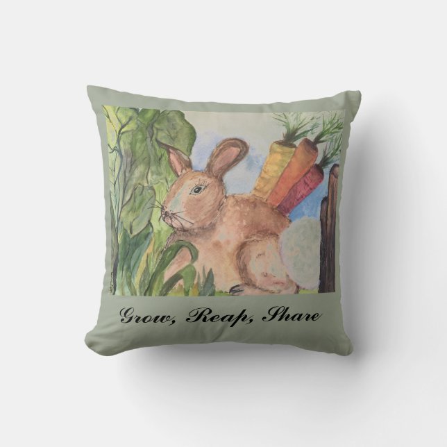 Accent pillow with rabbit in garden. (Front)