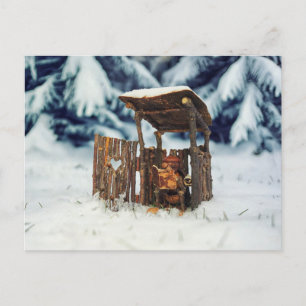 Acorn elf sitting on the toilet in winter postcard