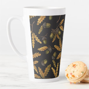 Acorns and oak leaves on black latte mug