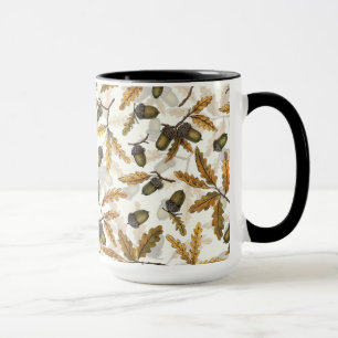 Acorns and oak leaves on off white mug
