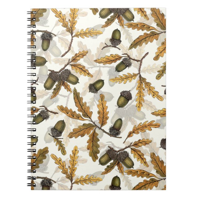 Acorns and oak leaves on off white notebook (Front)
