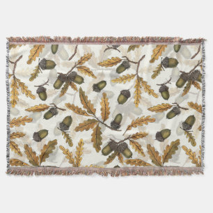 Acorns and oak leaves on off white throw blanket