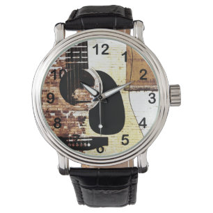 acoustic guitar on brick background watch
