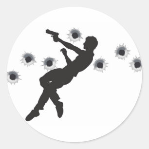 Action hero in gun fight silhouette classic round sticker