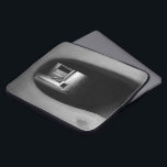 Adobe Passage Southwest photo Laptop Sleeve<br><div class="desc">Stylish laptop sleeve features a black and white photograph of an adobe passage. The Southwest photo has great depth and begins with a rounded opening in an adobe wall. Beyond it, a passage enveloped in blackness leads to a courtyard bathed in sunlight. The adobe wall furthest from view contains a...</div>
