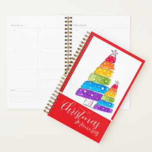 Adorable Baby in Santa Outfit with Christmas Planner