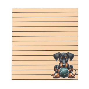 Adorable Doberman Puppy Playing with a Ball Notepad