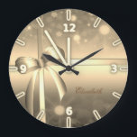 Adorable Elegant Gold Bow- Personalised Large Clock<br><div class="desc">This image features gold bow on luminosity background. . Any girl would love to have this stylish  design.If your art still needs to be adjusted, click on the Customise This button. This will take you to a design area where you can move around and even change fonts !</div>