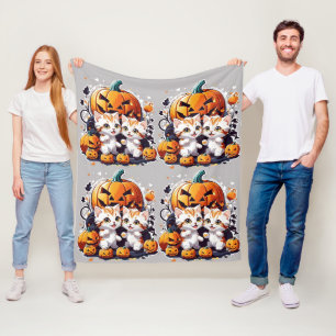 Adorable Kittens Playing with a Pumpkin Fleece Blanket