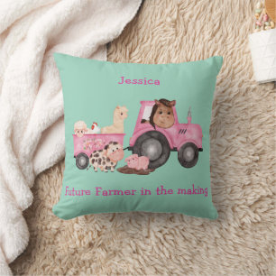 Adorable pink tractor & trailer with farm animals cushion