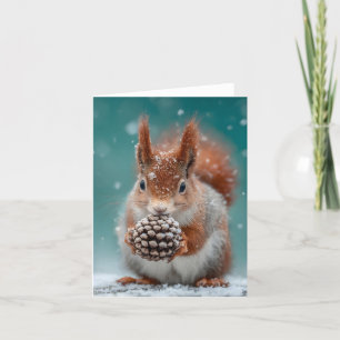 Adorable Red Squirrel in the Snow with a Pinecone Holiday Card