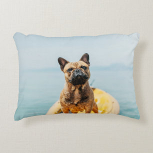 Adult brown French bulldog standing on kayak Decorative Cushion