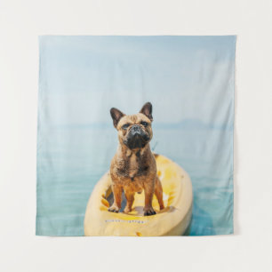 Adult brown French bulldog standing on kayak Tapestry