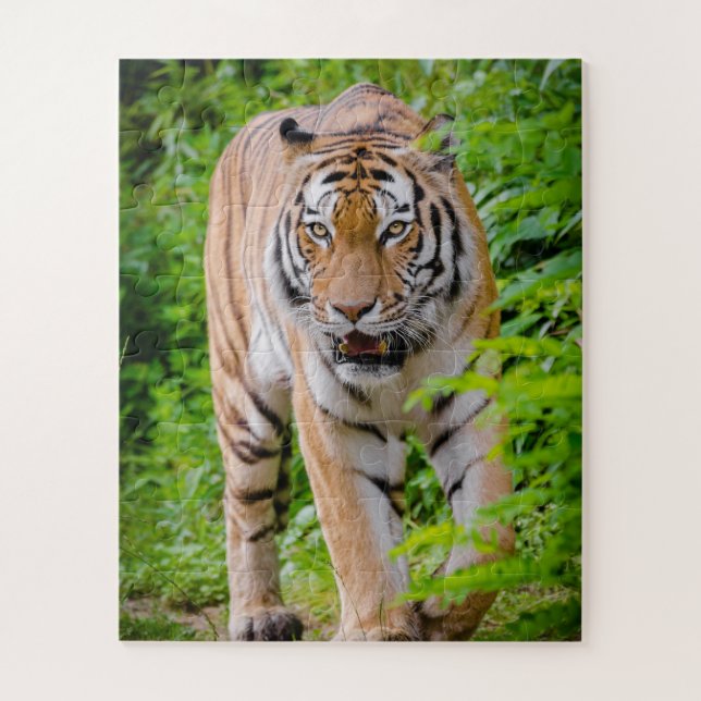 Adult Tiger Prowling Among Bright Green Leaves Jigsaw Puzzle (Vertical)
