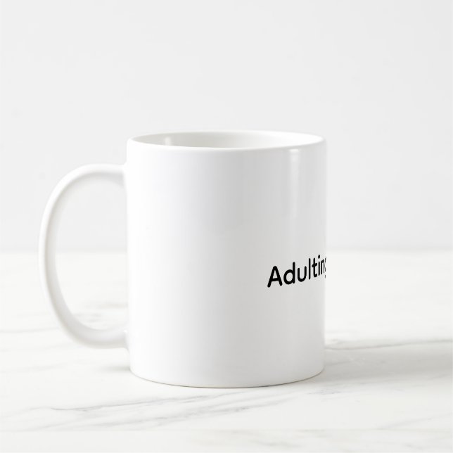 Adulting is a scam funny coffee mug (Left)