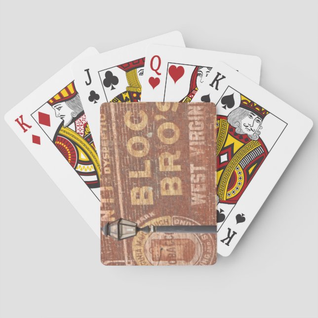 Advertisements on side of building playing cards (Back)