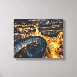 aerial photography of buildings at nighttime canvas print