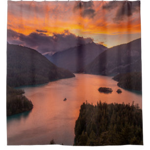 AERIAL PHOTOGRAPHY OF LAKE VIEWING MOUNTAIN UNDER SHOWER CURTAIN