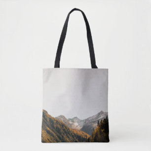 AERIAL PHOTOGRAPHY OF MOUNTAIN UNDER CLOUDY SKY TOTE BAG
