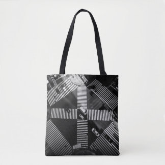 AERIAL PHOTOGRAPHY OF VEHICLES ON STREETS DURING D TOTE BAG