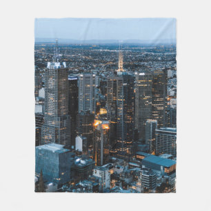 AERIAL VIEW OF CITY BUILDINGS DURING NIGHT TIME FLEECE BLANKET