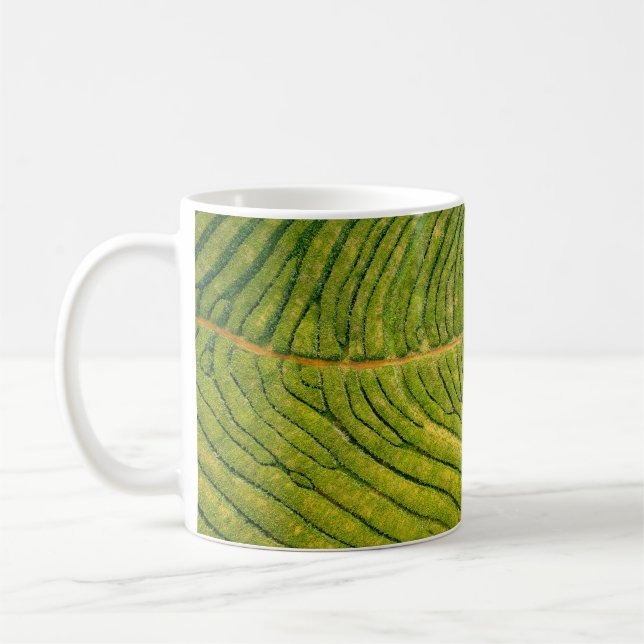Aerial view of green open field coffee mug (Left)
