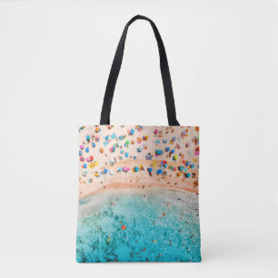 Aerial view of sandy beach with colourful umbrella tote bag