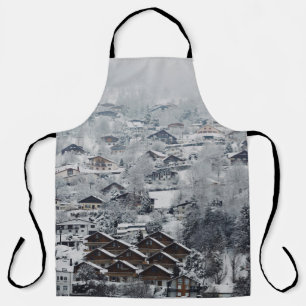 AERIAL VIEW OF VILLAGE COVERED WITH SNOW APRON