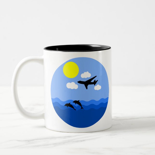 aeroplane flying over water with dolphins Two-Tone coffee mug (Left)