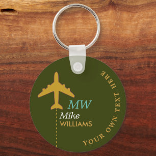 aeroplane on greenish keychain with name