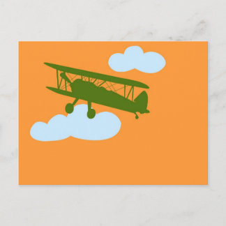 Aeroplane on plain orange background. postcard