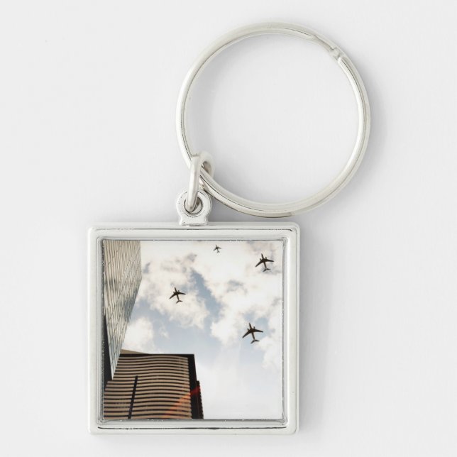Aeroplanes flying over buildings key ring (Front)