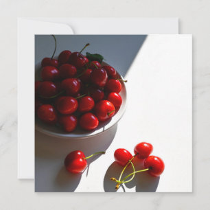 Aesthetic still life with ripe cherries on a white