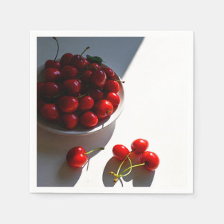 Aesthetic still life with ripe cherries on a white napkin
